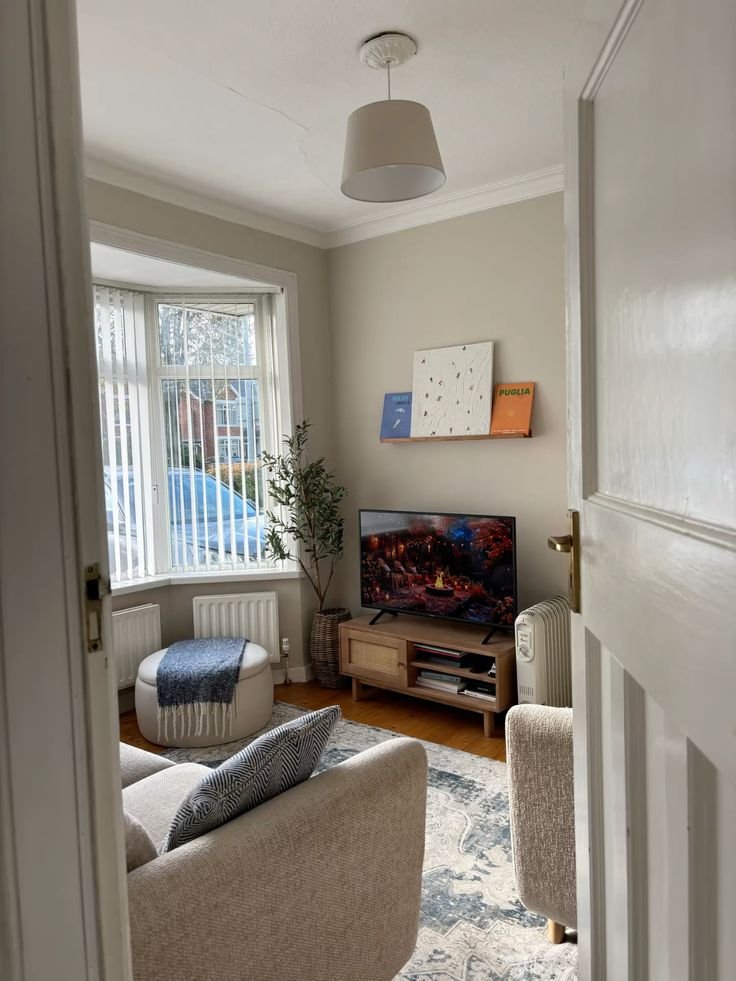 Decorated living room by SN & J Constructions in Northampton